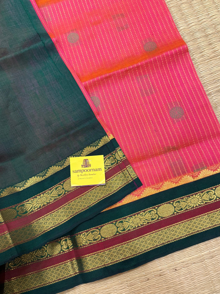 Magenta with Green , rich zari butta and vertical zari lines in the body, traditional borders  and rich Pallu Korvai Silk Cotton Saree