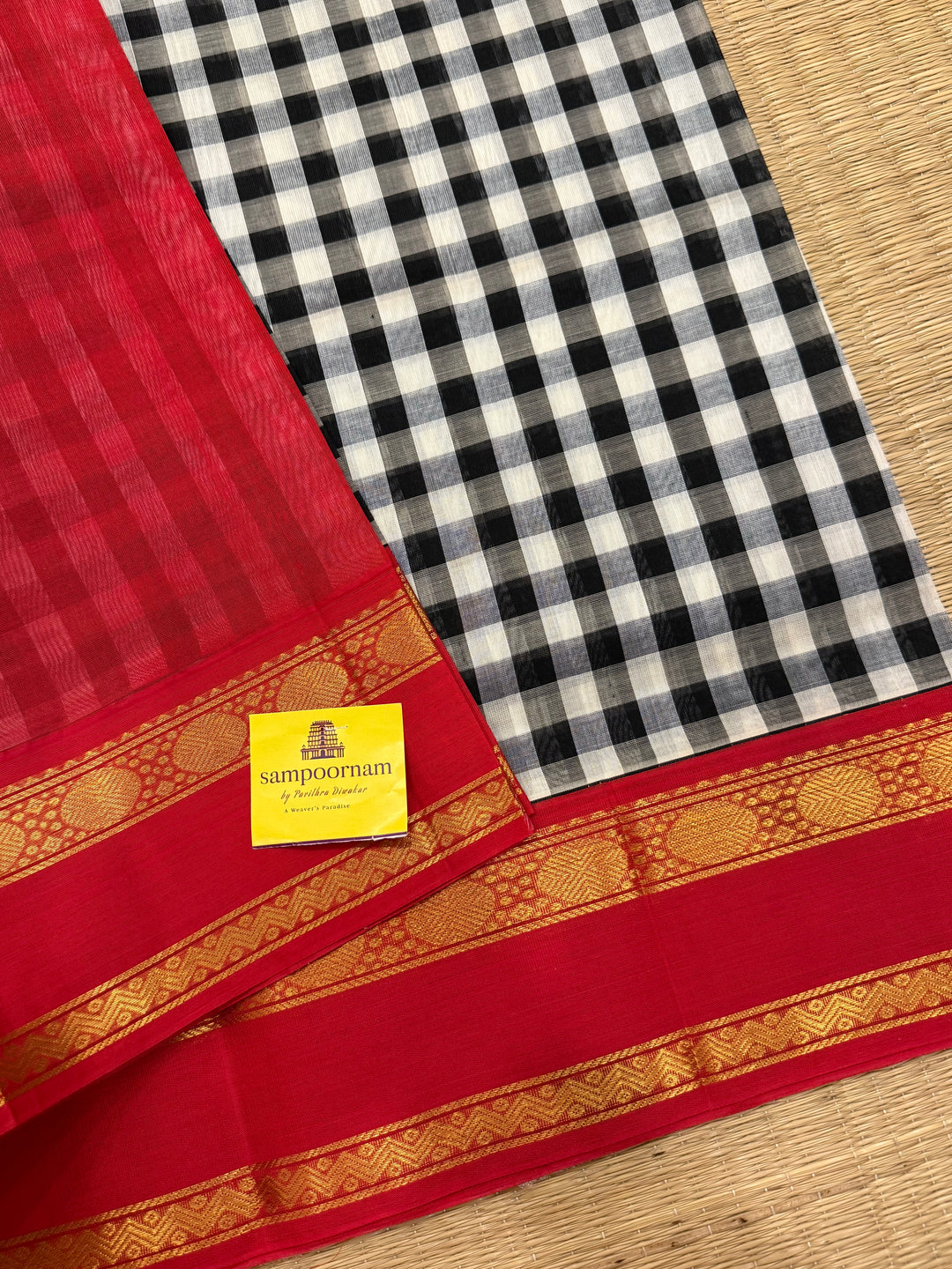 Black and White colour  checks with red , rettapet border and traditional rich Pallu Korvai Silk Cotton Saree