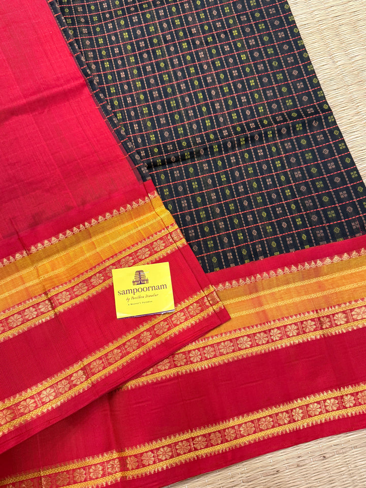 Black with red Lakshadeepam thread butta in the body , rettapet border and rich Pallu Korvai Silk Cotton Saree