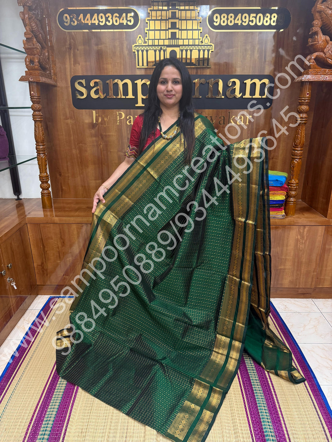 Green , Rich Traditional Borders and Lakshadeepam Zari Butta all over the body and Grand Pallu , Pure Silk Cotton Saree
