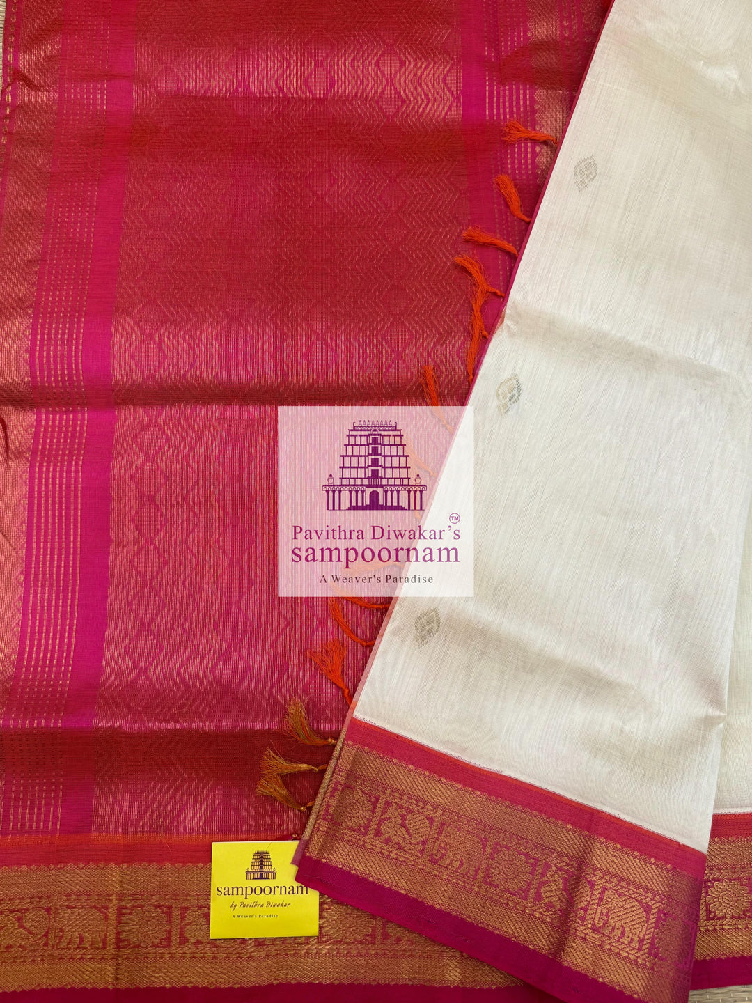 Halfwhite with Pink , Zari butta in the body ,traditional borders and rich Pallu Korvai Silk Cotton Saree