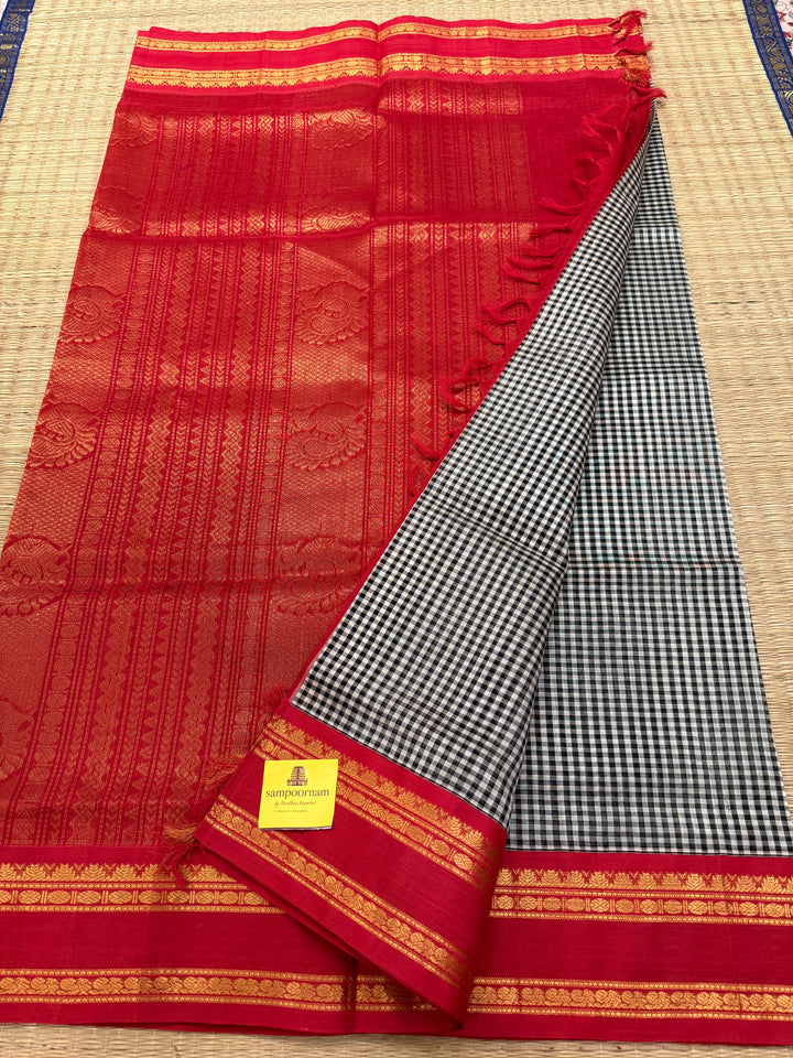Black and White Podi Kattaam with red colour , rettapet border and traditional rich Pallu Korvai Silk Cotton Saree