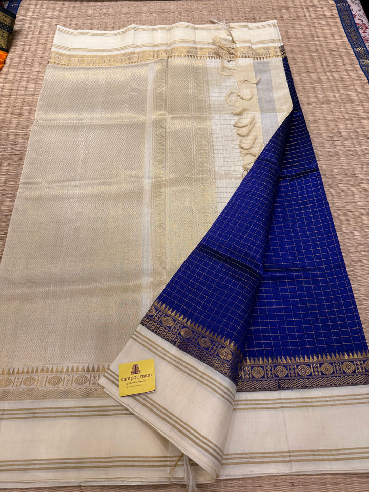 Dark Blue and Offwhite , Zari Kattam in the body ,rettapet traditional borders and rich Pallu Korvai Silk Cotton Saree