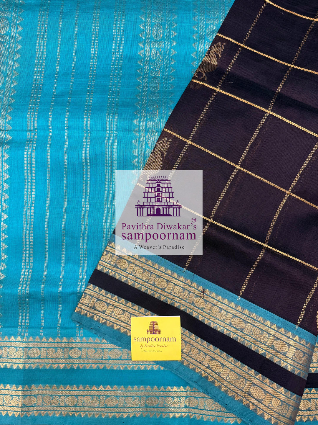 Black with Turquoise Blue , rich Zari checks in the body , Mayil and Chakram rich butta in the body , rettapet  borders and rich Pallu Silk Cotton Saree
