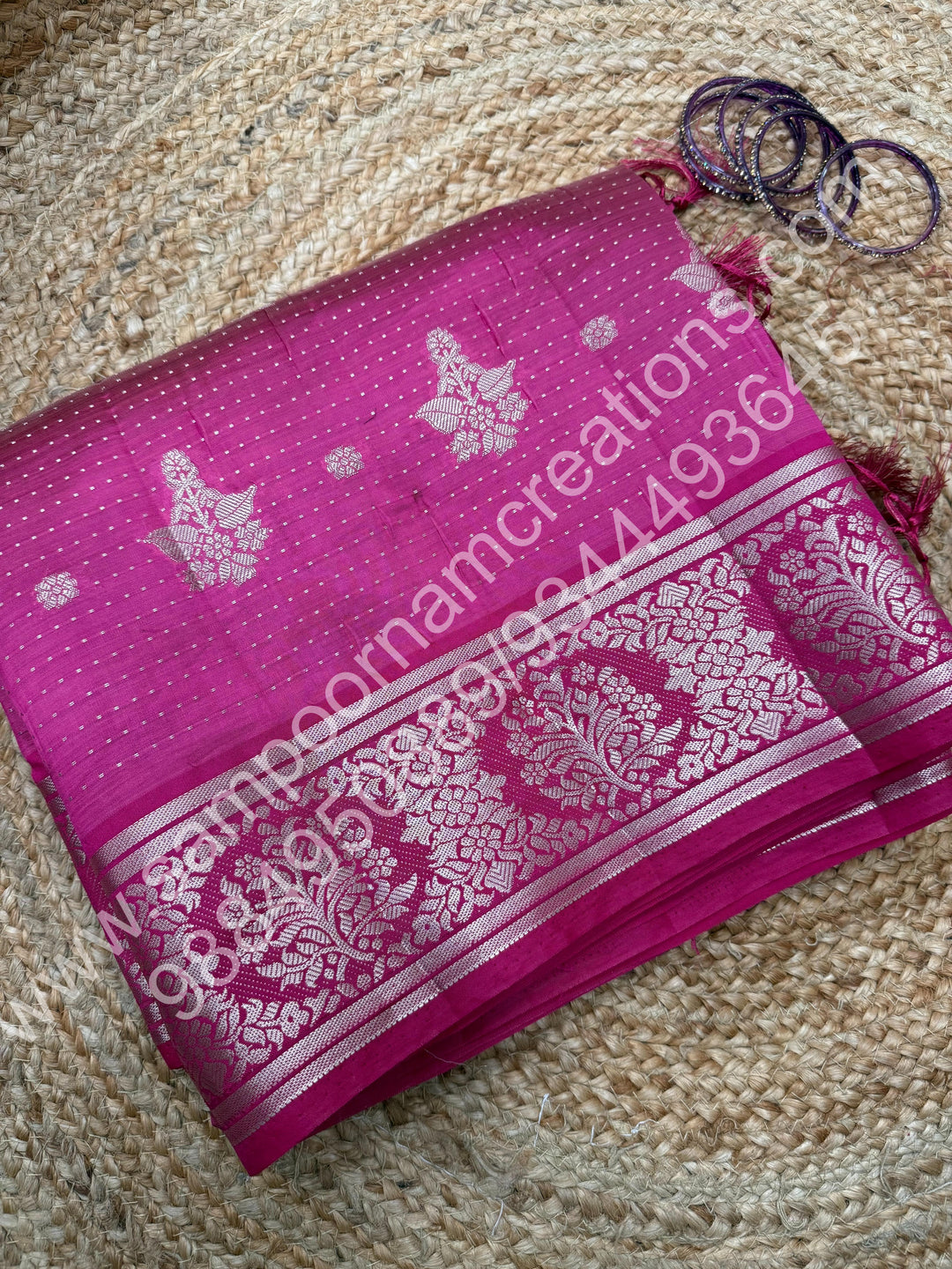 Rani Pink , Silver Floral buttas in the body with Silver Zari Border , Tissue Pallu and Tissue Blouse  , Semi Tussar Saree