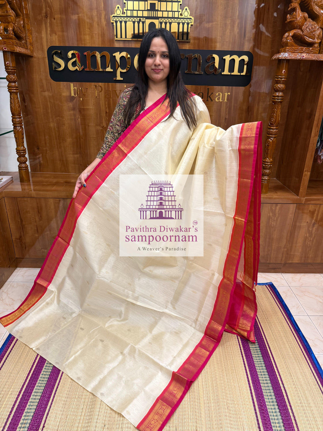 Halfwhite with Pink , Zari butta in the body ,traditional borders and rich Pallu Korvai Silk Cotton Saree