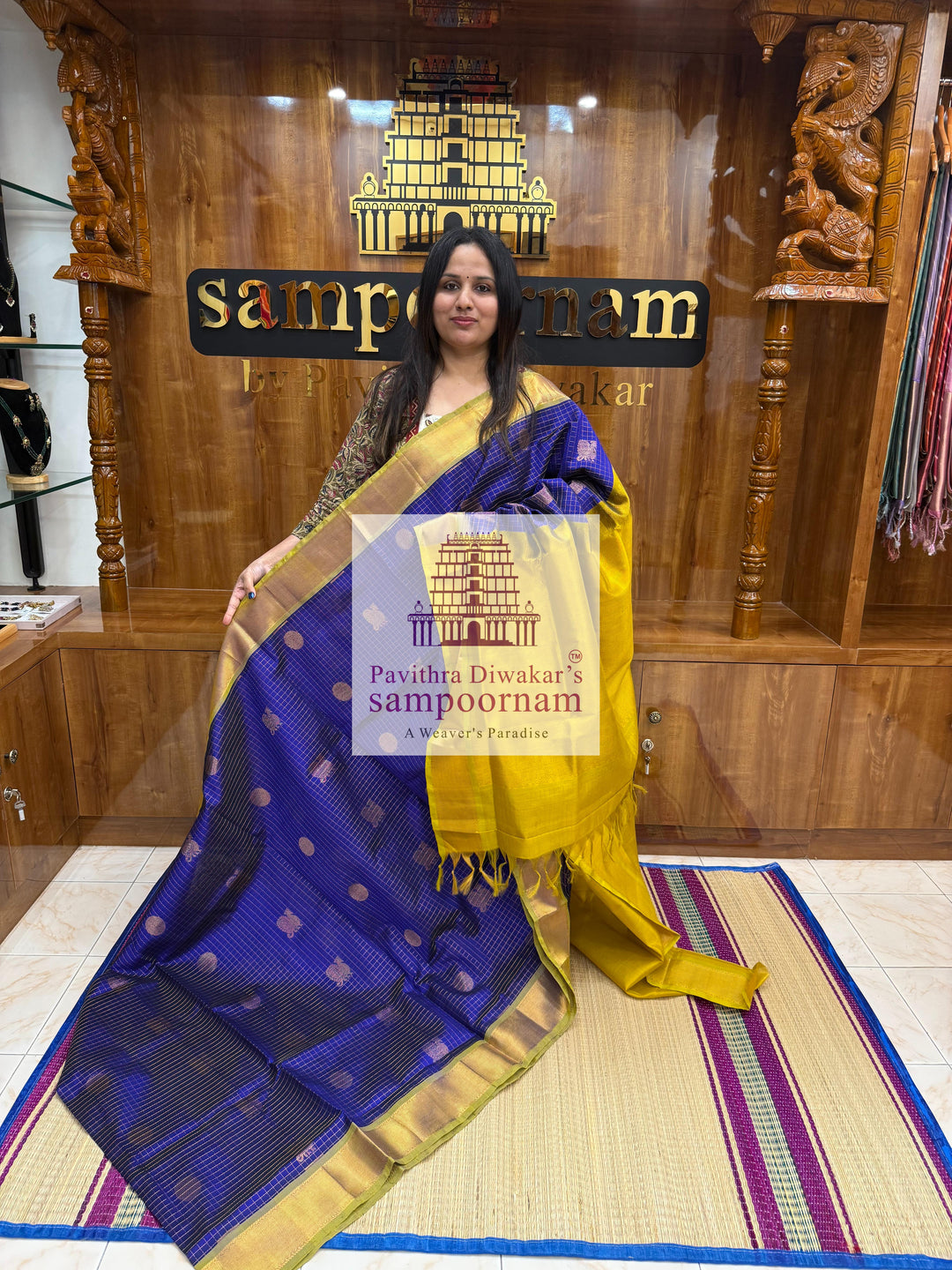 Blue with Lemon Yellow , rich Zari checks in the body , Mayil and Chakram rich butta in the body , traditional borders and rich Pallu Silk Cotton Saree