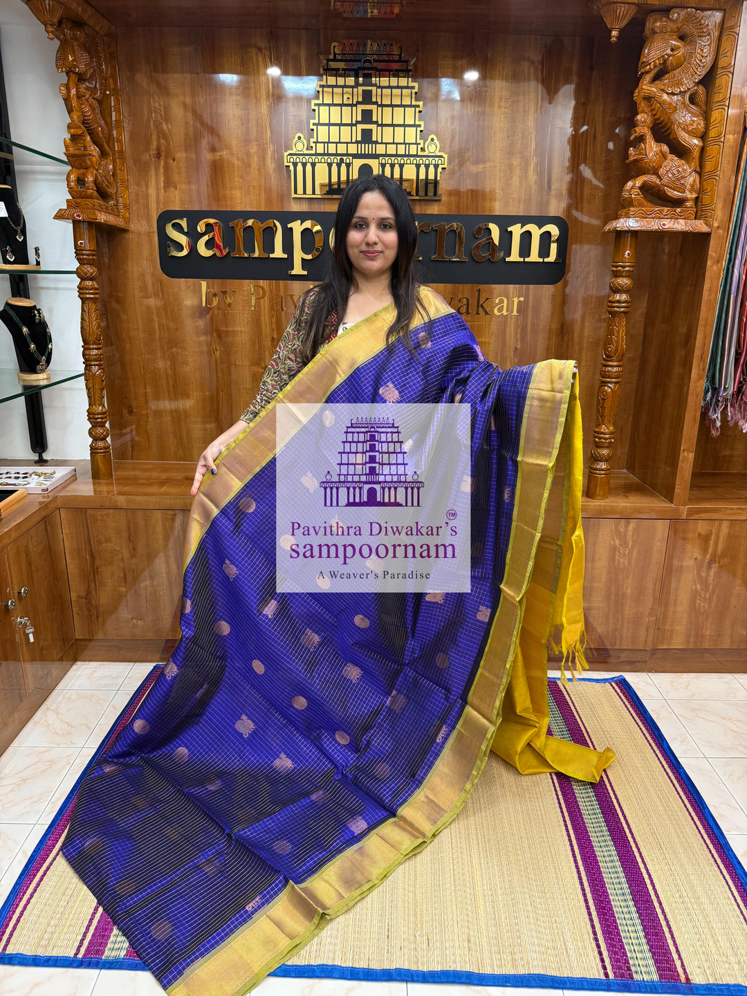 Blue with Lemon Yellow , rich Zari checks in the body , Mayil and Chakram rich butta in the body , traditional borders and rich Pallu Silk Cotton Saree