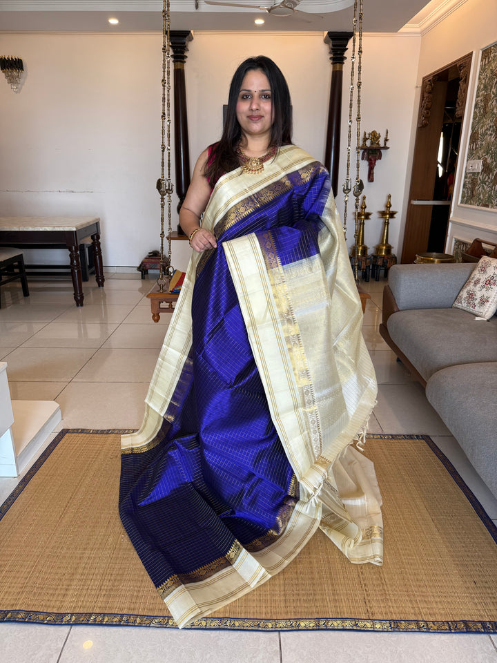 Dark Blue and Offwhite , Zari Kattam in the body ,rettapet traditional borders and rich Pallu Korvai Silk Cotton Saree