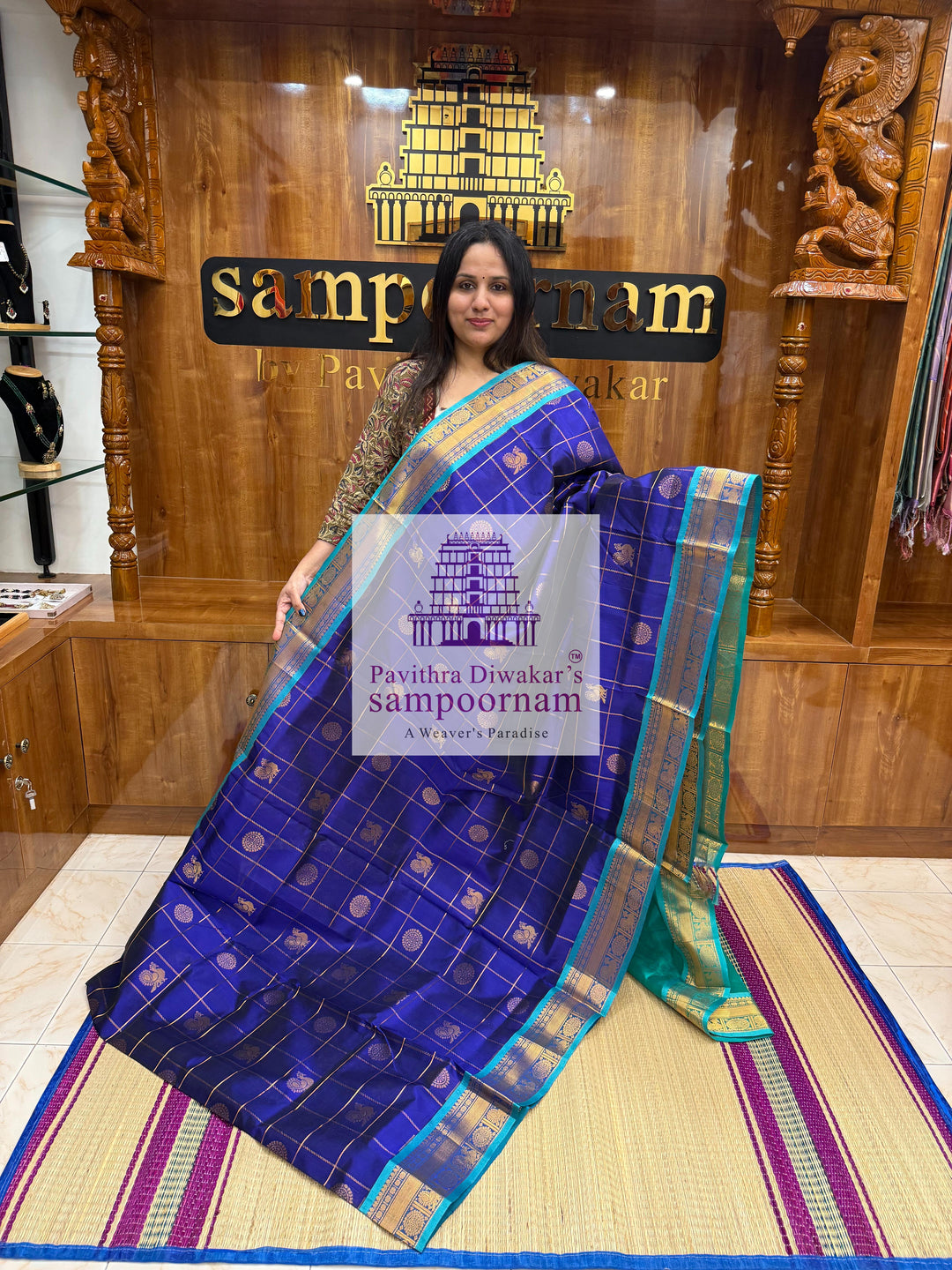 Dark Blue with Turquoise Blue  , rich Zari checks in the body , Mayil and Chakram rich butta in the body , traditional borders and rich Pallu Silk Cotton Saree