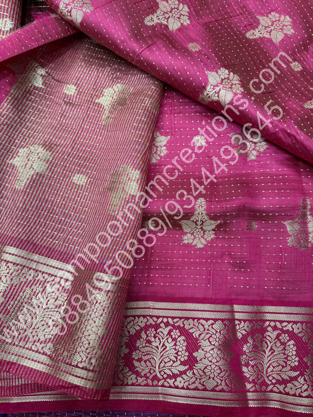 Rani Pink , Silver Floral buttas in the body with Silver Zari Border , Tissue Pallu and Tissue Blouse  , Semi Tussar Saree