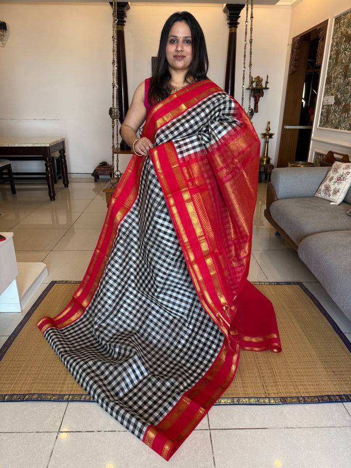 Black and White colour  checks with red , rettapet border and traditional rich Pallu Korvai Silk Cotton Saree
