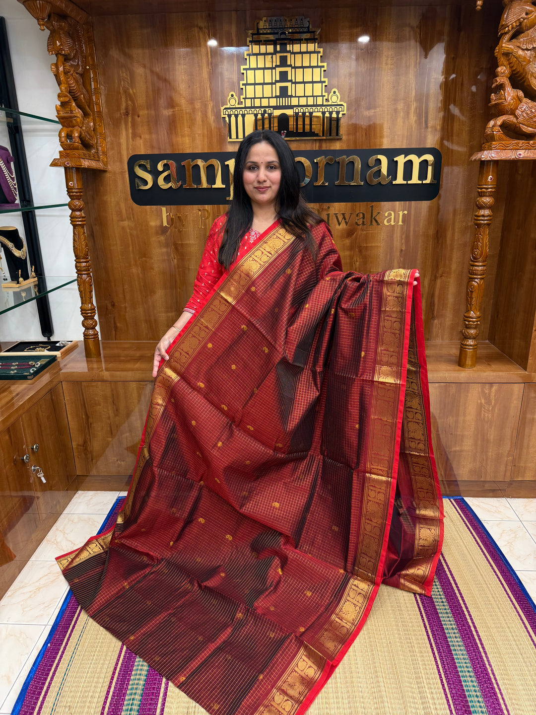 Dark Maroon with Red Selvedge,Podi Zari Kattam in the Body, Rich Butta, Traditional Borders and Rich Pallu Semi Silk Cotton Saree