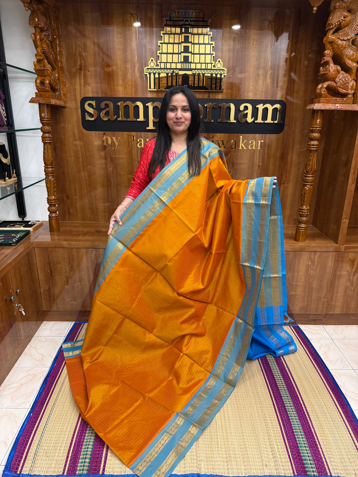 Orange with Blue , Zari Kattam in the Body, Traditional Rettapet Borders and Rich Pallu Semi Silk Cotton Saree