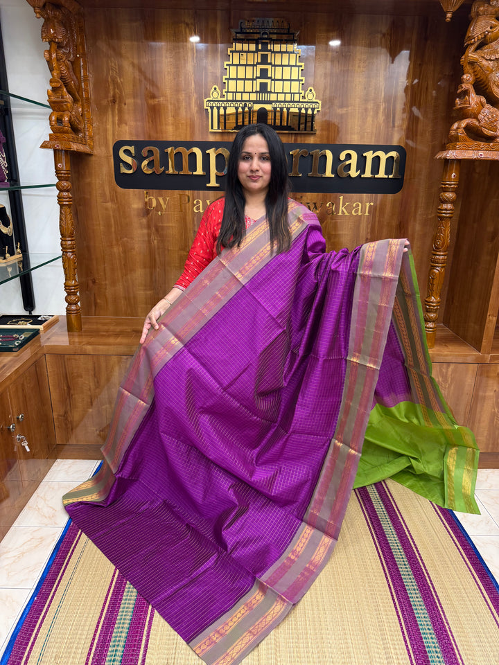 Purple with Leaf Green , Zari Kattam in the Body, Traditional Rettapet Borders and Rich Pallu Semi Silk Cotton Saree