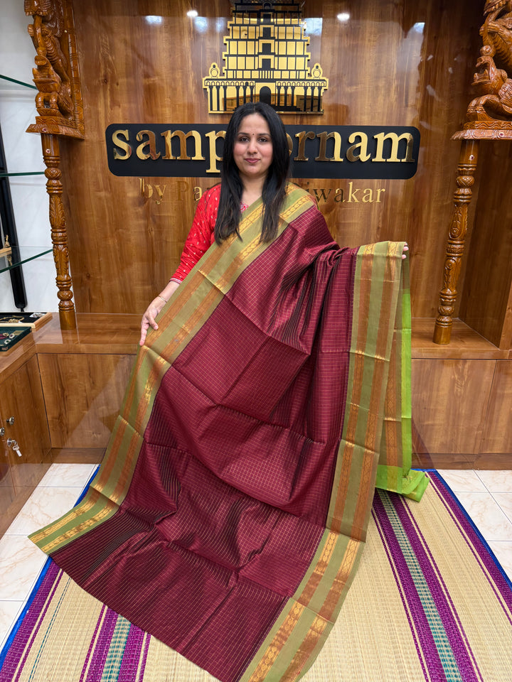 Maroon with Leaf Green, Zari Kattam in the Body, Traditional Rettapet Borders and Rich Pallu Semi Silk Cotton Saree