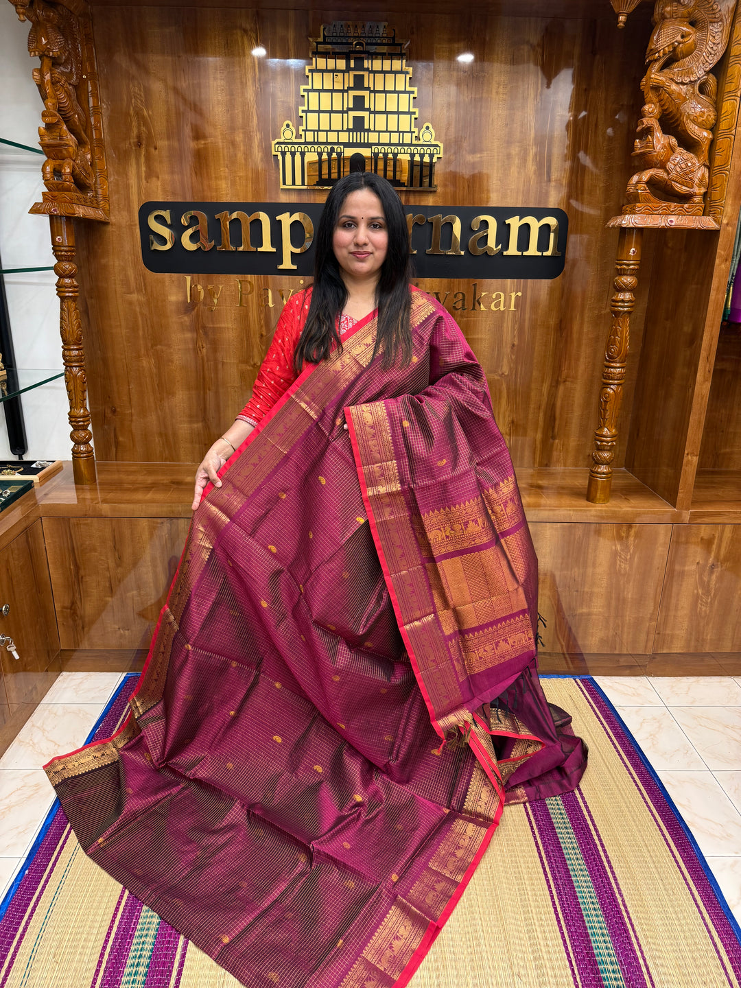 Dark magenta with Red Selvedge, Zari Kattam in the Body with Rich Butta, Traditional Borders and Rich Pallu Semi Silk Cotton Saree