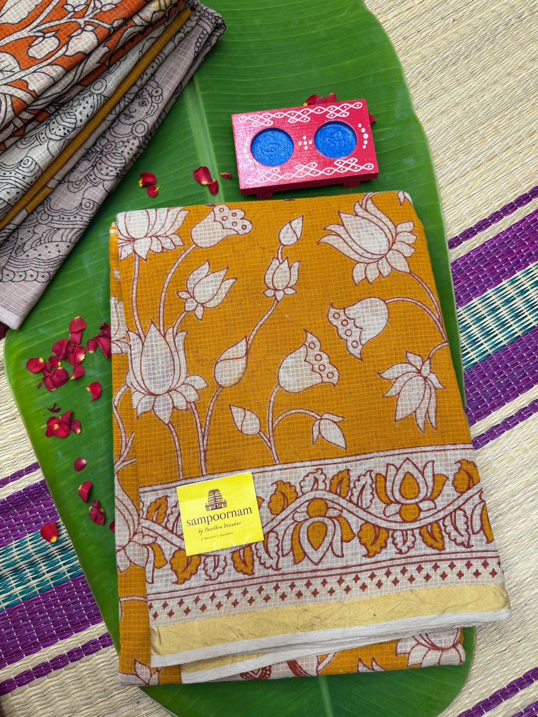 Light Orange  Kalamkari Prints in the body and Pallu Pure Kota Cotton Saree