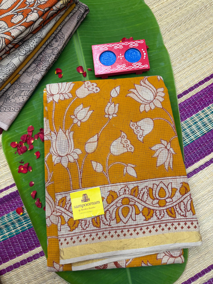 Light Orange  Kalamkari Prints in the body and Pallu Pure Kota Cotton Saree