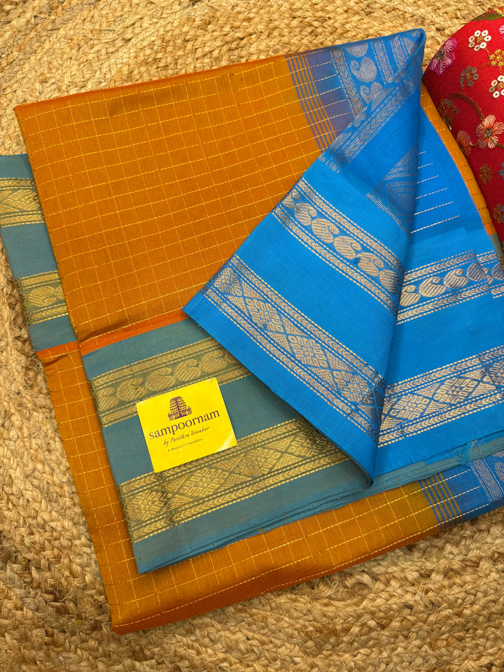 Orange with Blue , Zari Kattam in the Body, Traditional Rettapet Borders and Rich Pallu Semi Silk Cotton Saree