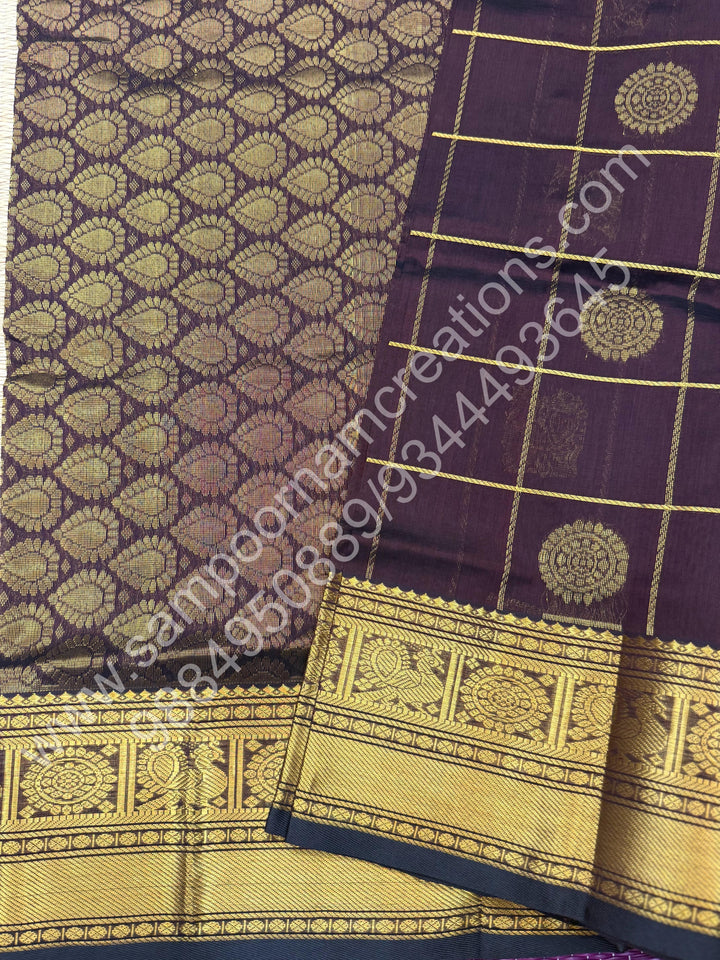 Cofee Brown , Rich Mayil and Chakram butta in the body with Zari Checks , Traditional borders and Rich Pallu Pure Silk Cotton Saree