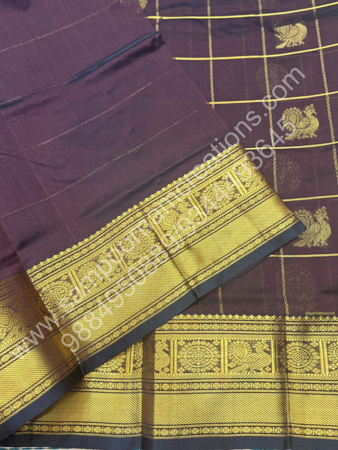 Cofee Brown , Rich Mayil and Chakram butta in the body with Zari Checks , Traditional borders and Rich Pallu Pure Silk Cotton Saree