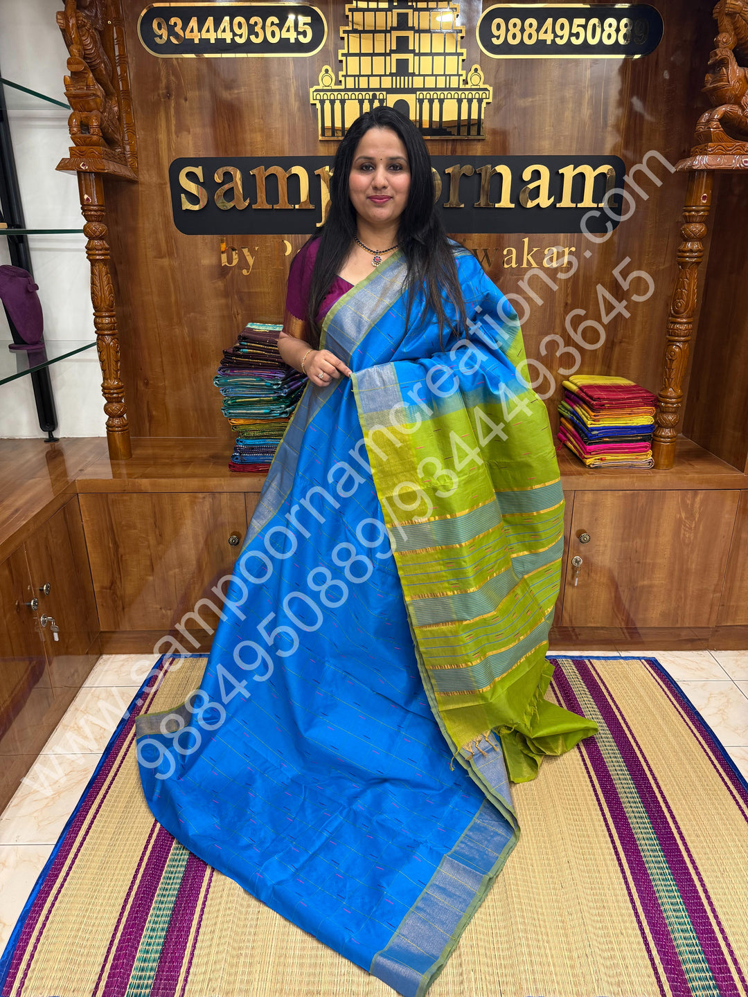Blue with Green , checks in the body and rain drop thread butta in the body and Pallu Semi Silk Cotton Saree