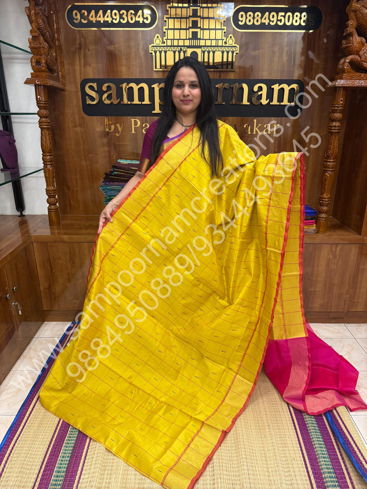 Lemon Yellow with Pink , checks in the body and rain drop thread butta in the body and Pallu Semi Silk Cotton Saree