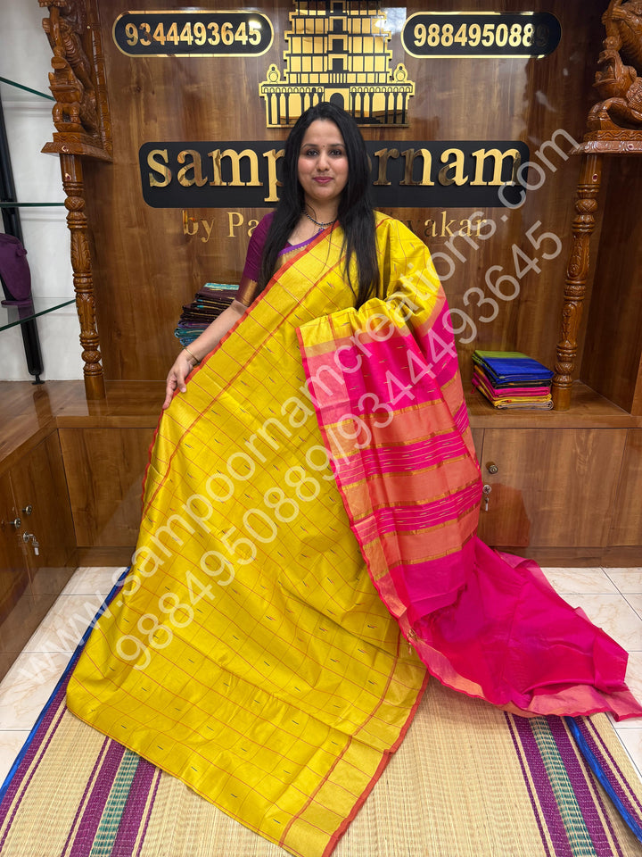 Lemon Yellow with Pink , checks in the body and rain drop thread butta in the body and Pallu Semi Silk Cotton Saree