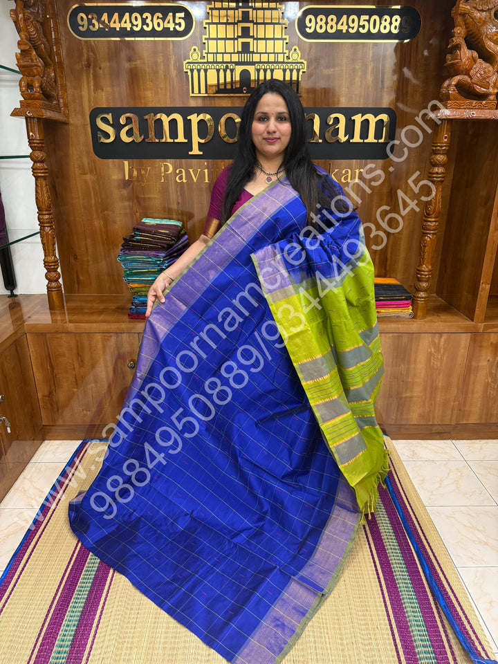 Royal Blue with Green , Checks in the body with  rain drop thread butta in the body and Pallu Semi Silk Cotton Saree