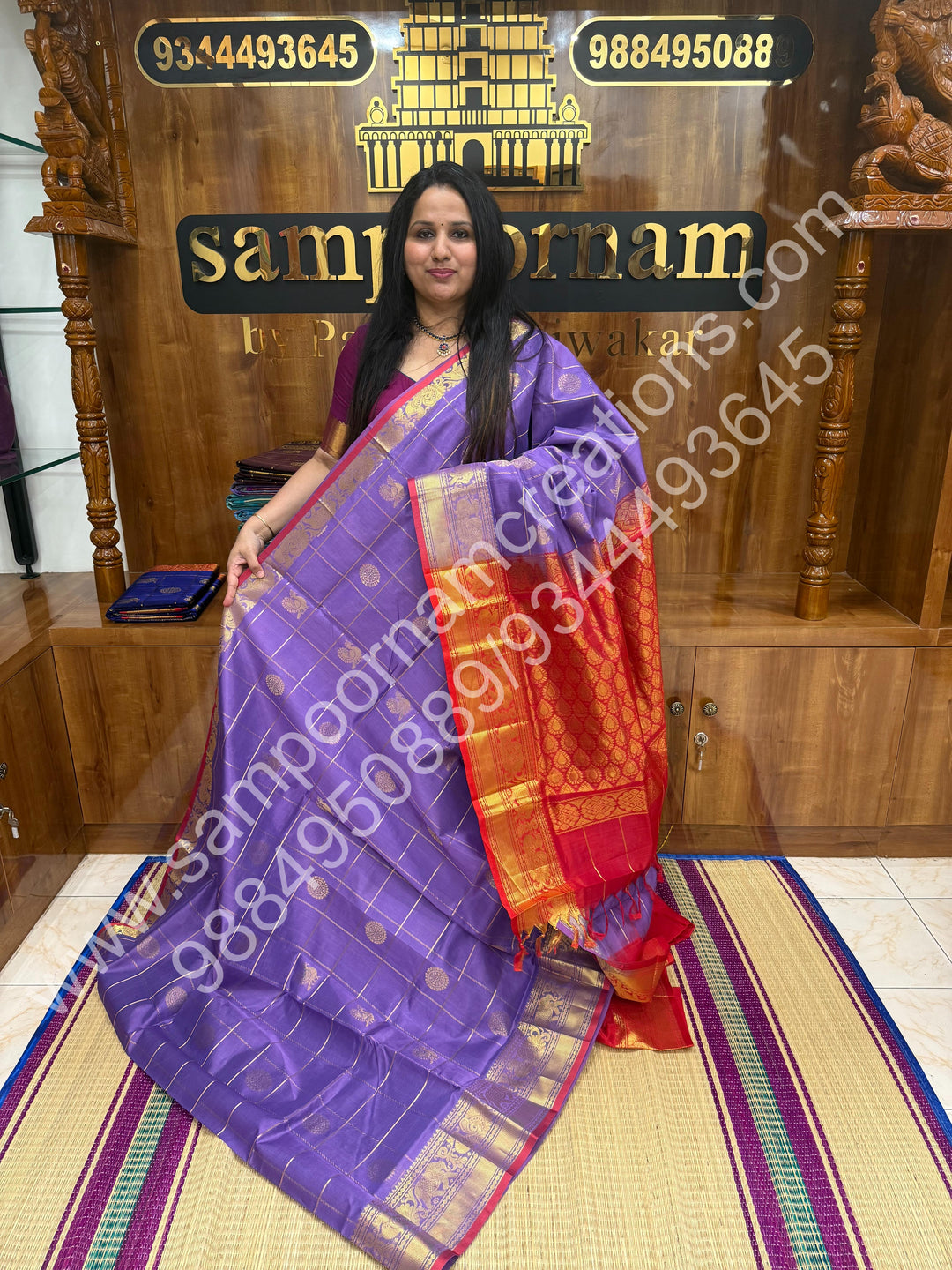 Lavender with Red , Rich Mayil and Chakram butta in the body with Zari Checks , Traditional borders and Rich Pallu Pure Silk Cotton Saree