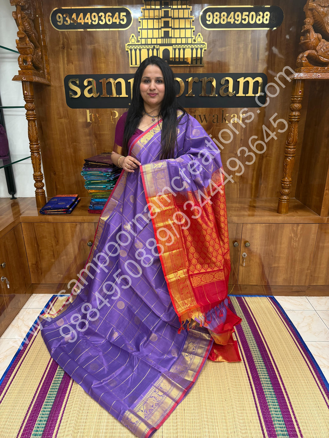 Lavender with Red , Rich Mayil and Chakram butta in the body with Zari Checks , Traditional borders and Rich Pallu Pure Silk Cotton Saree