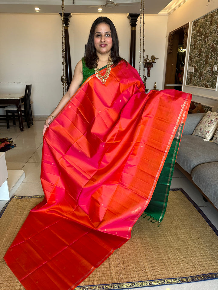 Orangish Red & Green Zari Butta in the body and Mayil Border - Rich Pallu Pure Soft Silk Saree