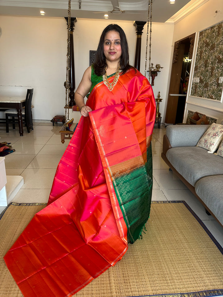 Orangish Red & Green Zari Butta in the body and Mayil Border - Rich Pallu Pure Soft Silk Saree