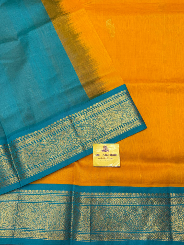 Mambazha Manjal with Turquoise Blue  , Rich Mayil Zari Butta in the body and  Traditional borders and Rich Pallu Korvai Silk Cotton Saree