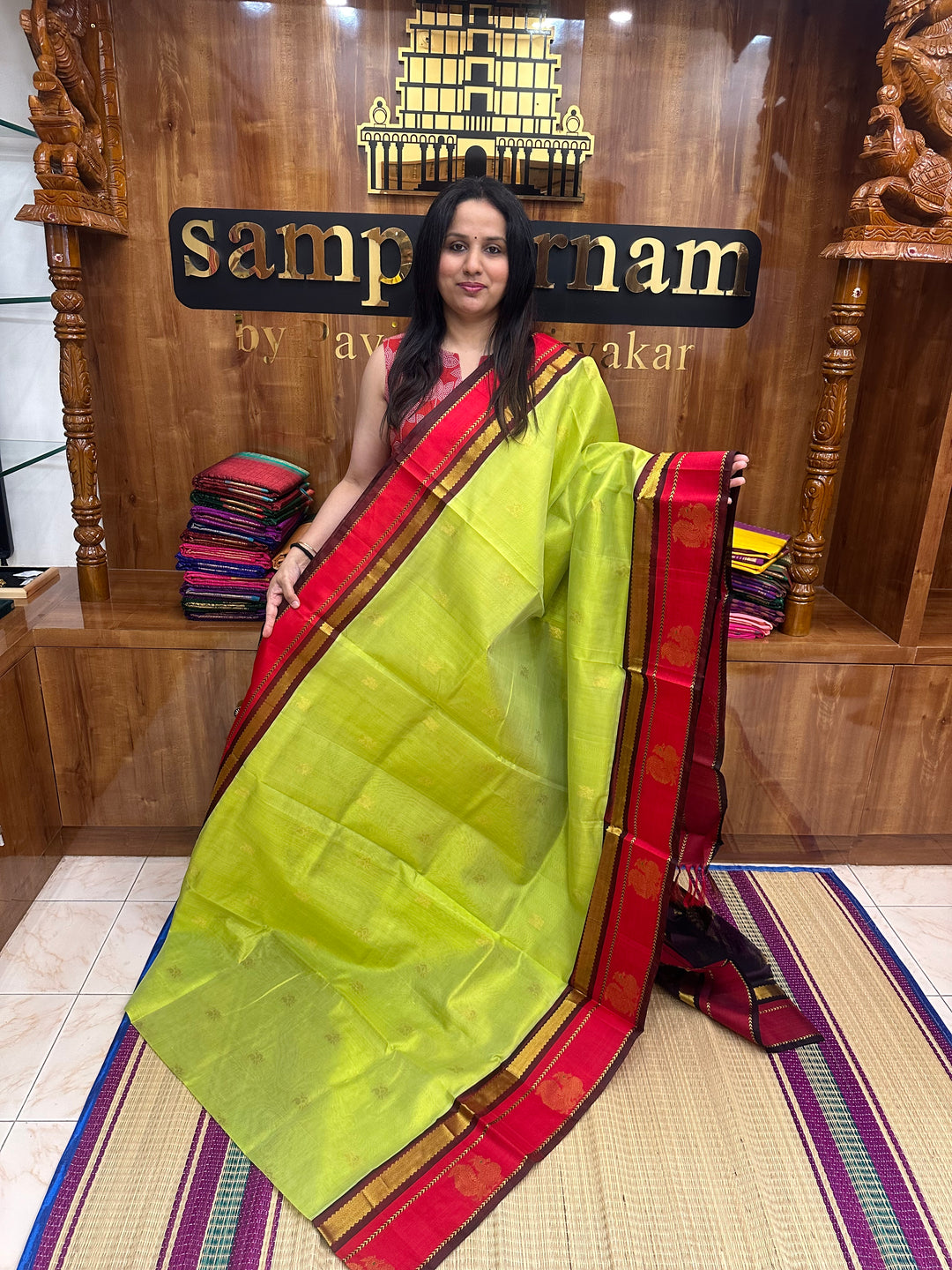 Parrot Green with Maroon ,  Rich Mayil Zari Butta in the body , Annam motif in the  border and , Rich Pallu Korvai Silk Cotton Saree