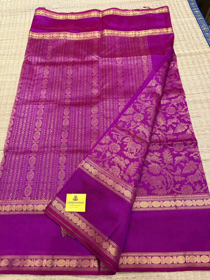 Dark magenta , rettapet border , rich Zari vanasingaram in the body and traditional Pallu , Korvai silk cotton saree