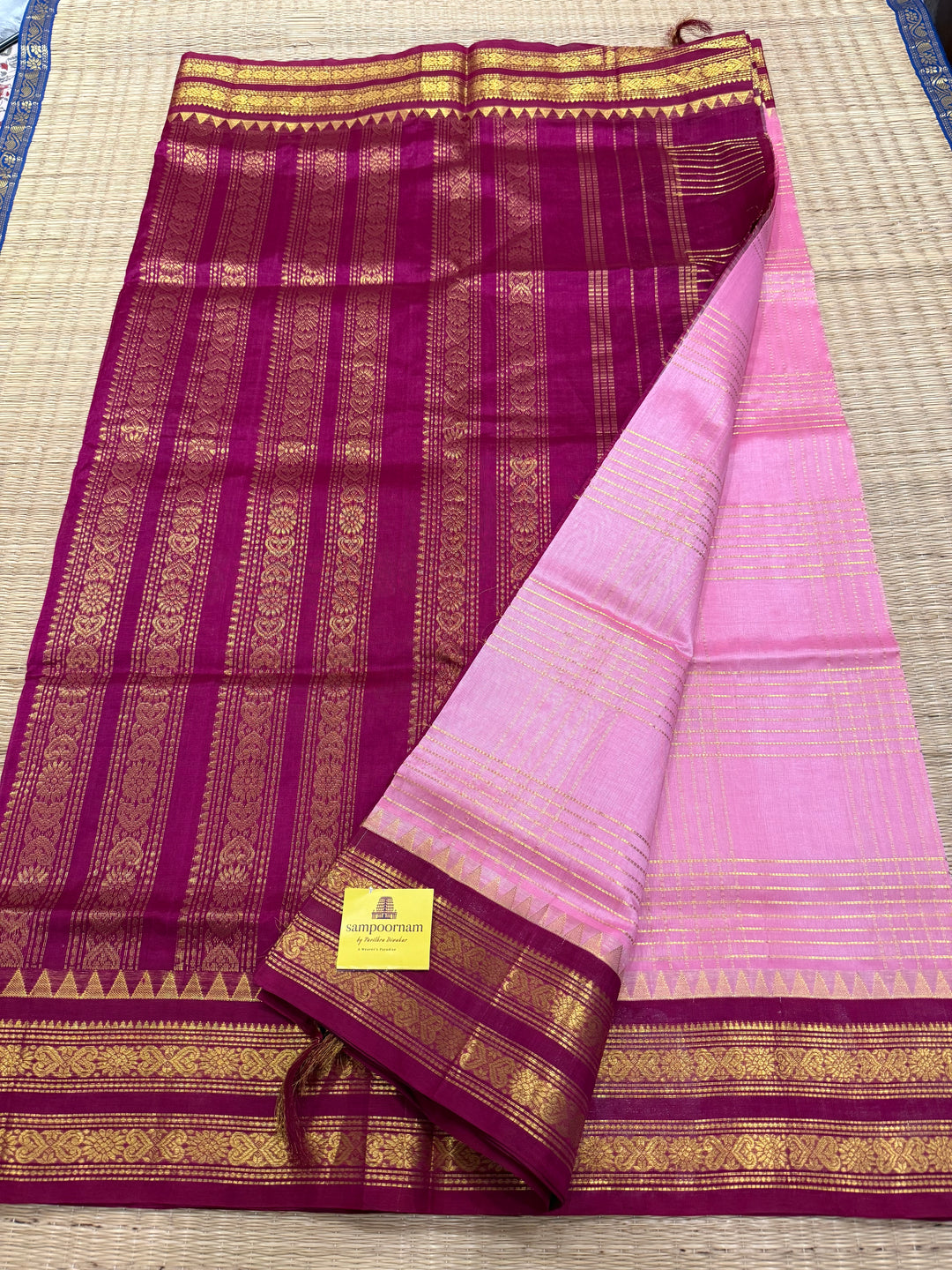 Onion Pink with Magenta rich Zari lines in the body , Kanchi rich border and traditional Pallu Korvai Silk Cotton Saree
