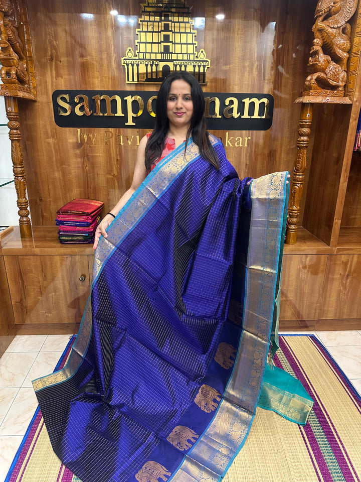 Blue with Turquoise Blue , Zari Checks in the body with One side Elephant Motif in the borders , Rich Pallu Silk Cotton Saree