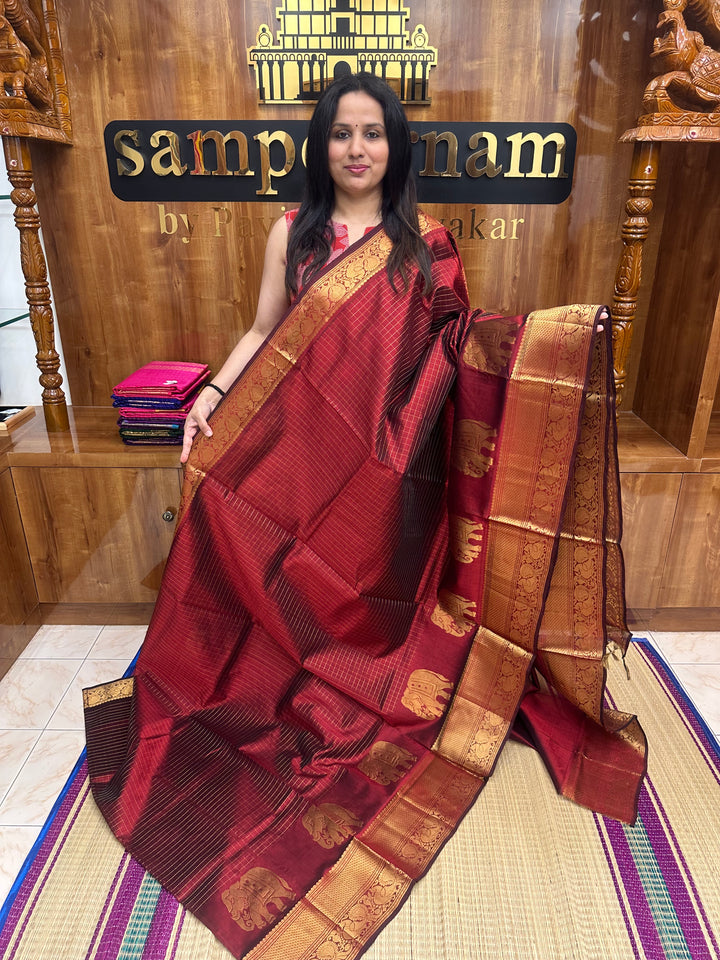 Arakku, Zari Checks in the body with One side Elephant Motif in the borders , Rich Pallu ,Silk Cotton Saree