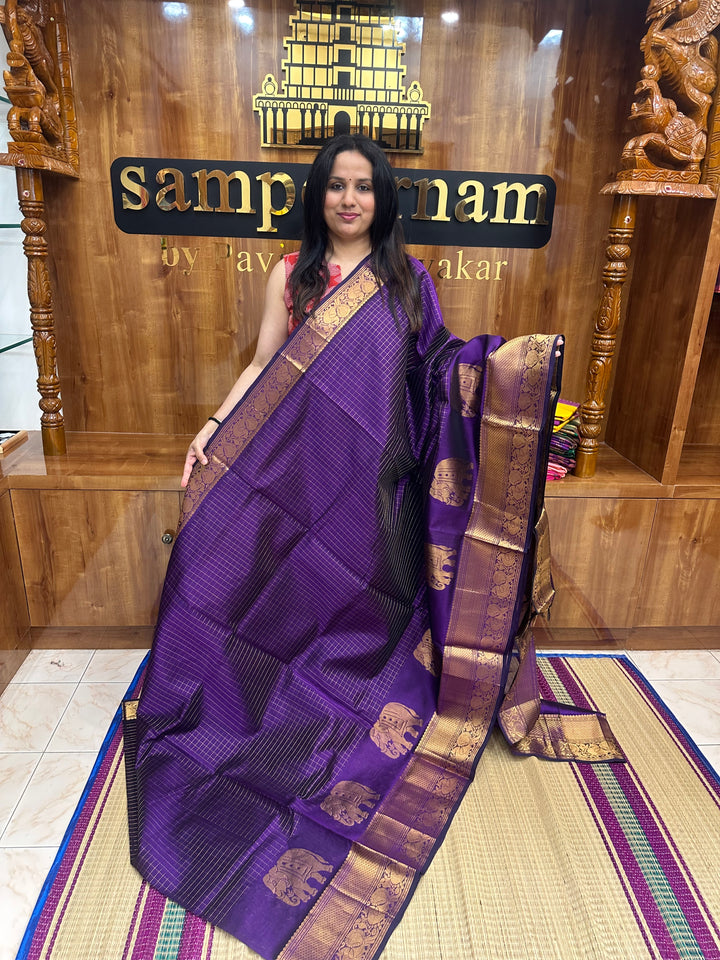 Violet , Zari Checks in the body with One side Elephant Motif in the borders , Rich Pallu ,Silk Cotton Saree