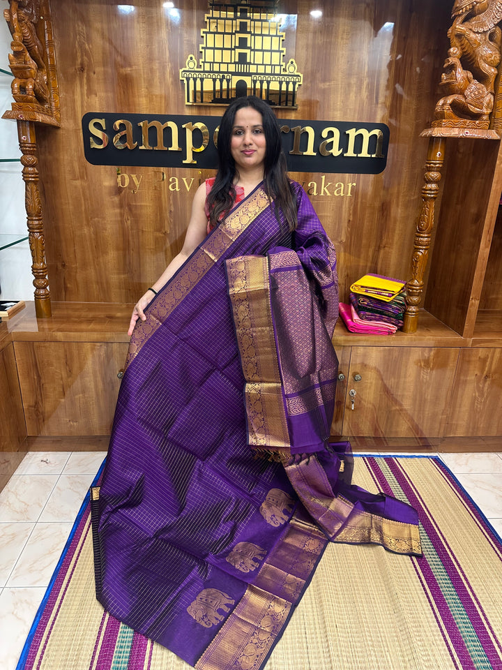 Violet , Zari Checks in the body with One side Elephant Motif in the borders , Rich Pallu ,Silk Cotton Saree