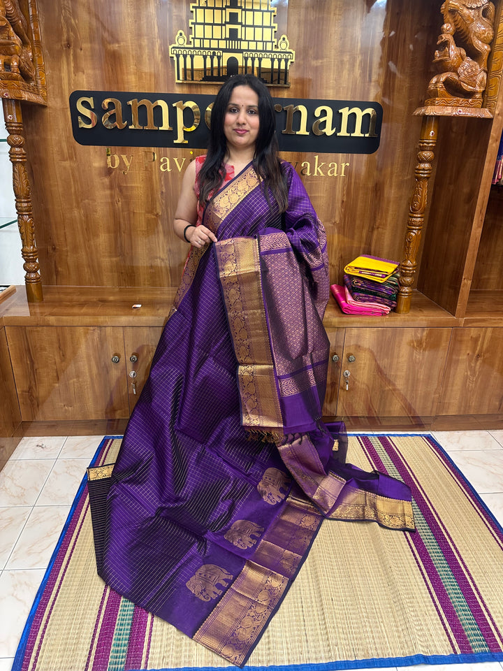 Violet , Zari Checks in the body with One side Elephant Motif in the borders , Rich Pallu ,Silk Cotton Saree