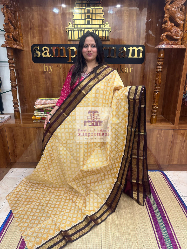 Light Gold with Araku  , Kolam Prints all over the body , rettapet border and rich Pallu , Korvai Silk Cotton Saree