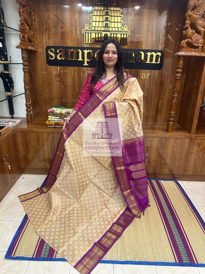 Light Gold with Magenta  , Kolam Prints all over the body , Traditional Rettapet border rich Pallu  Korvai Silk Cotton Saree