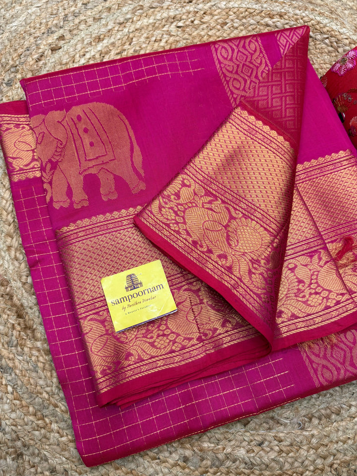 Rani Pink , Zari Checks in the body with One side Elephant Motif in the borders , Rich Pallu ,Silk Cotton Saree