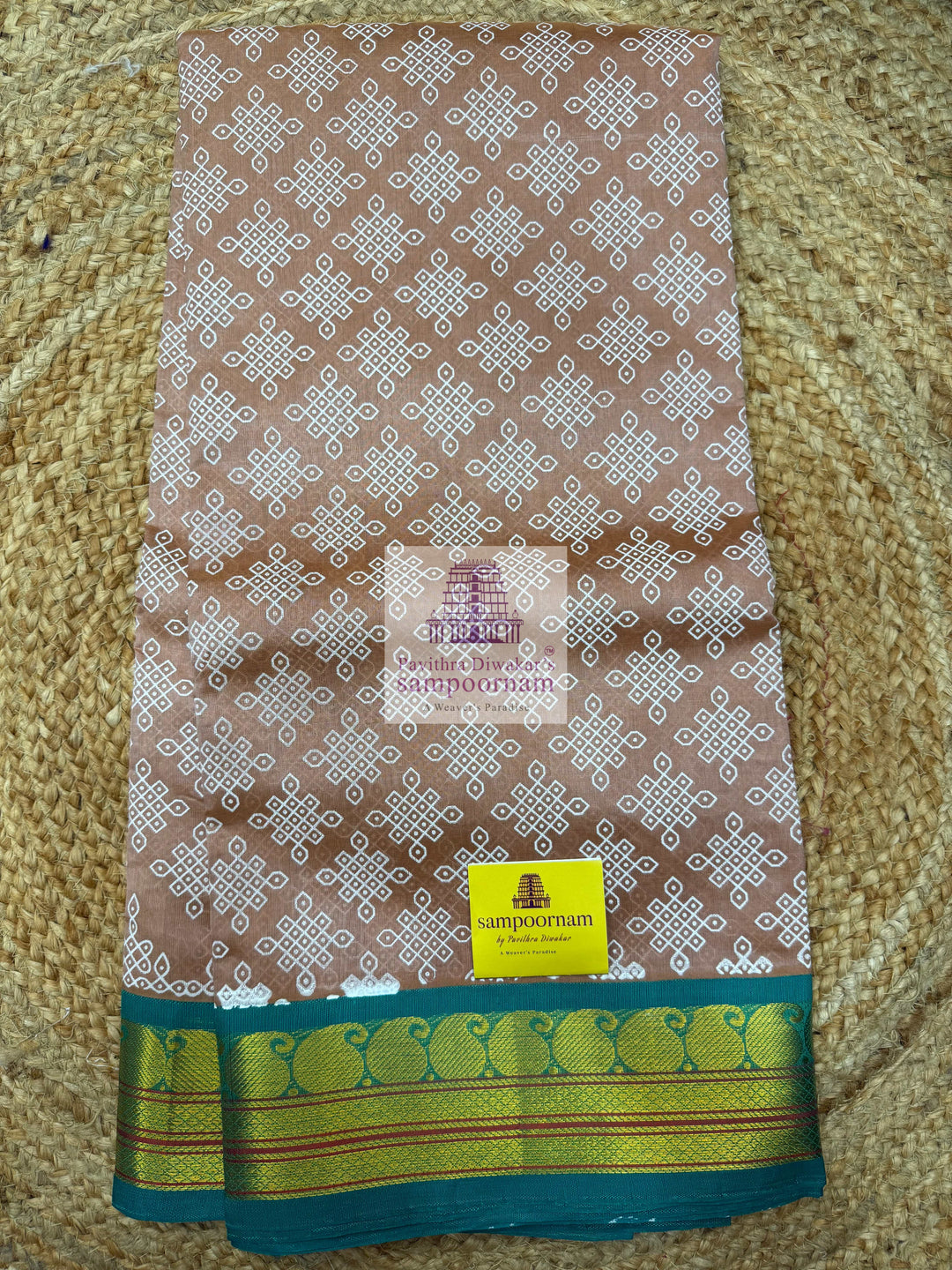 Biscuite with Sea Green  , Kolam Prints all over the body , Traditional borders & rich Pallu  Korvai Silk Cotton Saree