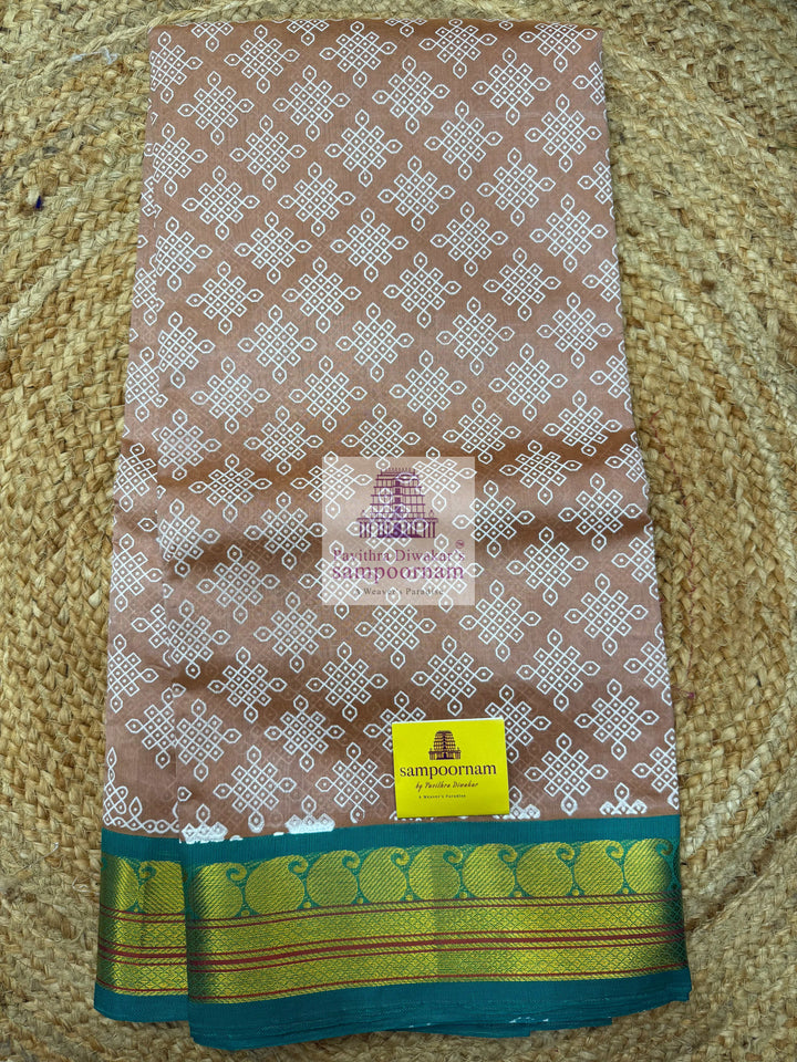 Biscuite with Sea Green  , Kolam Prints all over the body , Traditional borders & rich Pallu  Korvai Silk Cotton Saree
