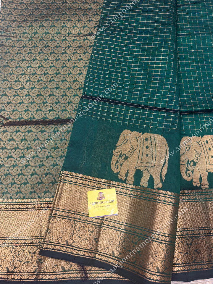 Dark Green , Zari Checks in the body with One side Elephant Motif in the borders , Rich Pallu ,Silk Cotton Saree