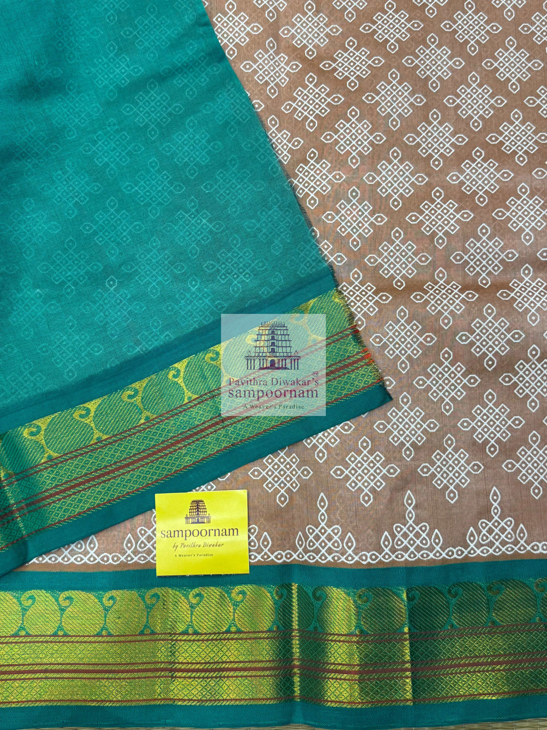 Biscuite with Sea Green  , Kolam Prints all over the body , Traditional borders & rich Pallu  Korvai Silk Cotton Saree